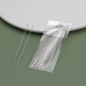 Detailed view of long big eye beading needles set in clear plastic bag for jewelry DIY