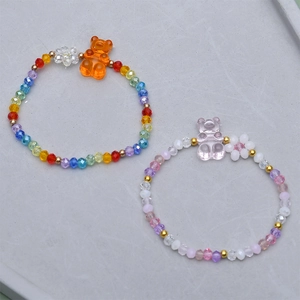Faceted 4mm glass bead bracelets with rainbow colors and cute gummy bear charms