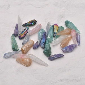 Macro detail of colorful irregular quartz crystal pillars with top holes for DIY jewelry