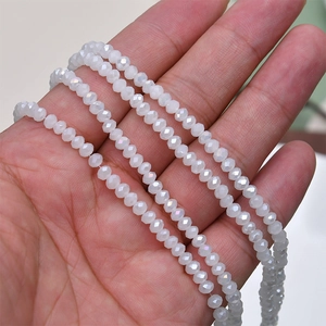 Macro view of 4mm faceted AB crystal glass beads for DIY jewelry making and crafting