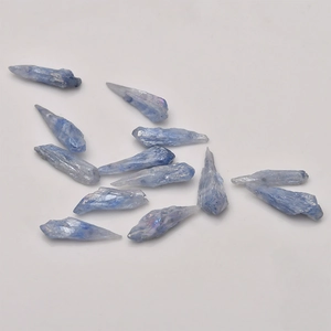 Macro view of raw blue kyanite crystal points showing natural textures and deep mineral blue