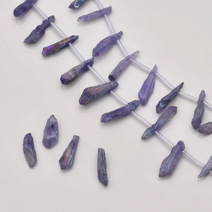 Macro shot of irregular purple crystal quartz beads for DIY jewelry necklace making