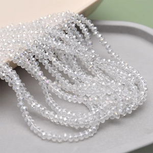 Macro shot of 4mm faceted AB crystal glass beads for DIY jewelry making and crafts