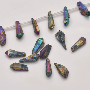 Macro shot of iridescent rainbow aura quartz crystal points for DIY jewelry making
