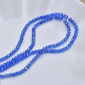 Macro view of 4mm cobalt blue faceted crystal glass beads for DIY jewelry making