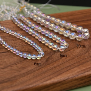 Detailed comparison of 6mm, 8mm, and 10mm iridescent glass beads with aurora borealis finish