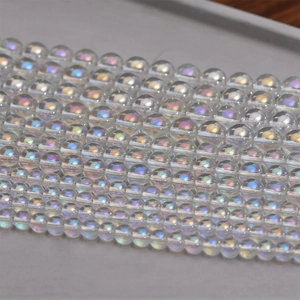Macro view of iridescent crystal glass round beads with aurora colorful glossy finish