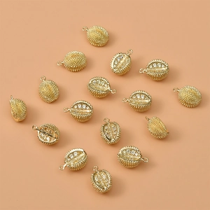 Macro view of 14K gold plated durian pendants with white cubic zirconia for DIY jewelry