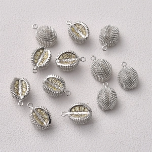 Macro view of 14K gold plated durian pendants with yellow cubic zirconia for DIY jewelry