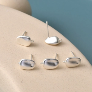 Irregular matte silver pebble earrings with hanging loops for DIY jewelry making