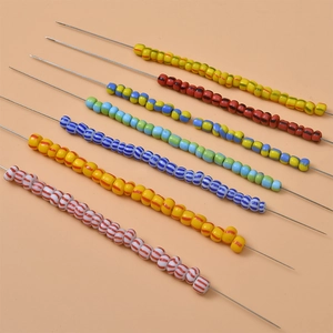Close-up of colorful striped glass seed beads for DIY jewelry making and crafts