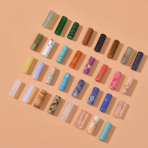 Close-up of polished cylindrical gemstone tube beads for DIY jewelry making
