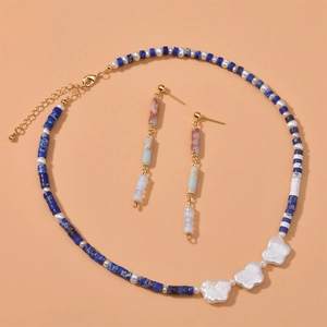 Handmade necklace and earring set with blue cylinder beads and white baroque pearls