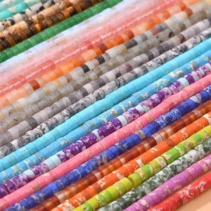 Detailed macro view of assorted natural stone spacer beads for DIY jewelry making crafts