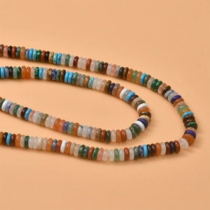Macro shot of colorful mixed natural stone disc beads for DIY jewelry making and crafts