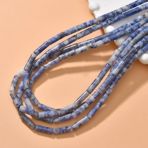 Macro detail of natural blue stone cylinder beads for DIY jewelry making and necklaces