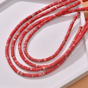 Macro detail of red marble texture cylindrical stone beads for DIY jewelry making