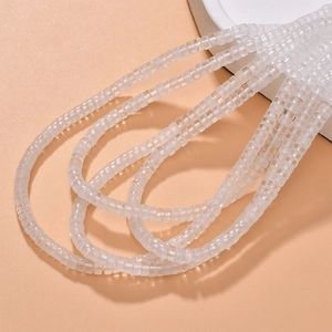 Translucent white square stone beads for DIY jewelry making on a minimalist base