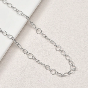 Détails de la chaîne nouée en argent avec texture torsadée pour bijoux DIY