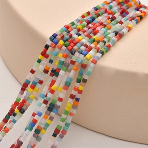 Macro view of colorful 2mm square glass sugar beads for DIY bracelet and necklace jewelry
