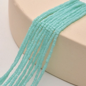 Detailed view of 2mm mint green square crystal glass beads for DIY jewelry making