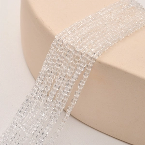 Detailed view of 2mm square crystal glass beads with high transparency for DIY jewelry