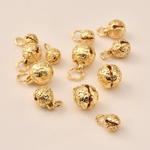Golden starry hollow bell pendants with moon and star patterns for DIY jewelry making