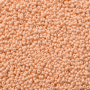 Macro-opname van pastelkleurige perzik glaskraaltjes met een gladde glazuurafwerking