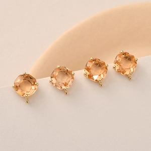 Set of four champagne hexagonal crystal pendants with 14k gold plated settings for jewelry