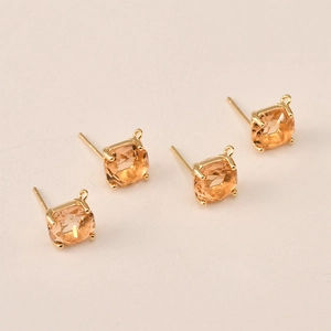 Detailed view of 14k gold-plated square cubic zirconia stud earring findings with loop