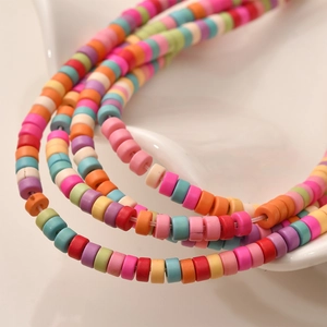 Detail of colorful Heishi clay beads for DIY jewelry with vibrant bohemian style texture
