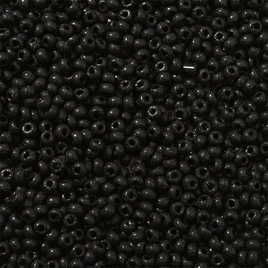 Macro-opname van zwarte 3mm kralen met gepolijste afwerking voor DIY sieraden