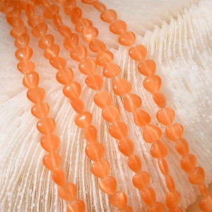 8mm heart cat eye beads in warm orange for DIY jewelry making and necklace crafting