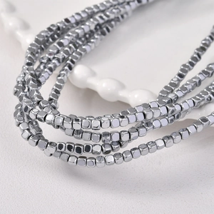 Detailed view of 3mm silver hematite square beads with metallic luster for jewelry DIY