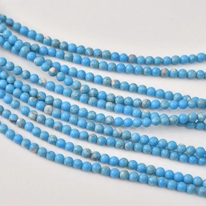 Primer plano de cuentas de piedra natural azul de 4-5mm con vetas para joyería DIY