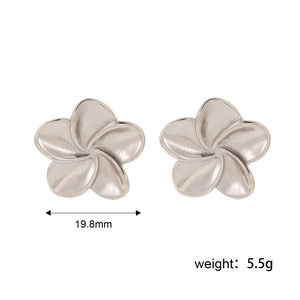 Macro shot of silver five-petal flower stud earrings measuring 19.8mm in diameter