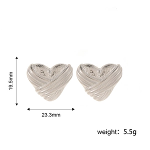 Minimalist silver textured heart hoop earrings with dimensions 19.5mm by 23.3mm