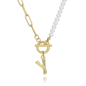 Gold OT clasp necklace with white pearls and a capital letter Y pendant