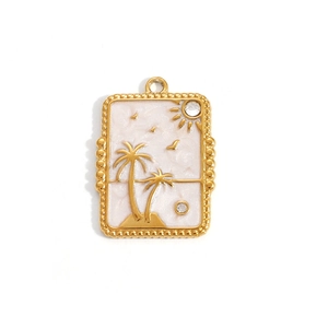 Detailed macro shot of a tropical palm tree pendant with white enamel and zircons