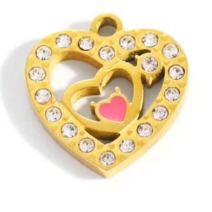 Detailed view of triple-layered gold heart pendant with pink enamel and zircon stones