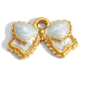 Detailed view of a gold bow-shaped pendant with blue marble enamel finish and top loop