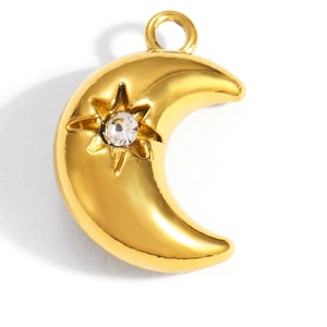 Detail of a gold-plated crescent moon charm with a sparkling star-set zircon gemstone