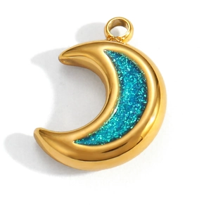 Macro shot of gold crescent moon pendant with sparkling turquoise glitter infill detail