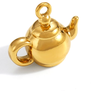 Detailed view of teapot shaped gold pendant with a polished mirror finish for DIY jewelry