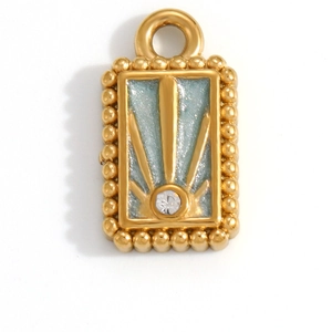 Detail of gold-plated pendant with blue enamel and sunburst rhinestone center