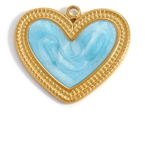 Macro shot of heart charm with light blue enamel inlay and beaded gold metal border