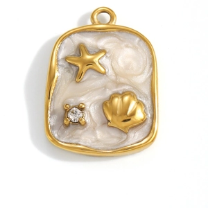 Macro detail of a golden ocean-themed square pendant with starfish and seashell shell inlay