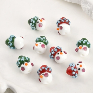 Handmade glass snowman beads with colorful hats for DIY jewelry and Christmas crafting