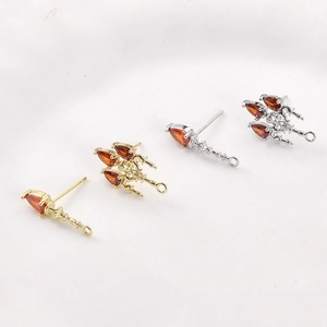 14k gold-plated trident earring components with orange pear-shaped zircon crystals