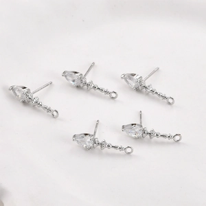Detail of five S925 sterling silver ear studs with teardrop zircon and DIY hanging loops
